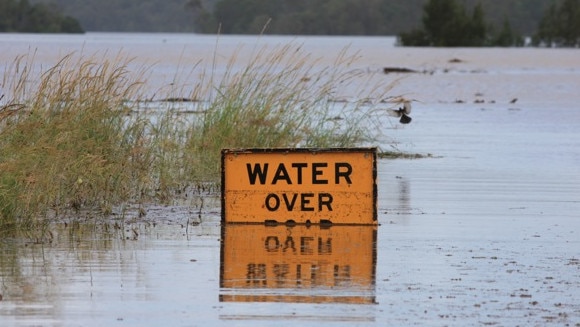 The Wivenhoe-Somerset Road on January 11, 2011, after the flood compartment of Wivenhoe Dam flooded the road to a depth of several metres. Picture: Mark Solomons