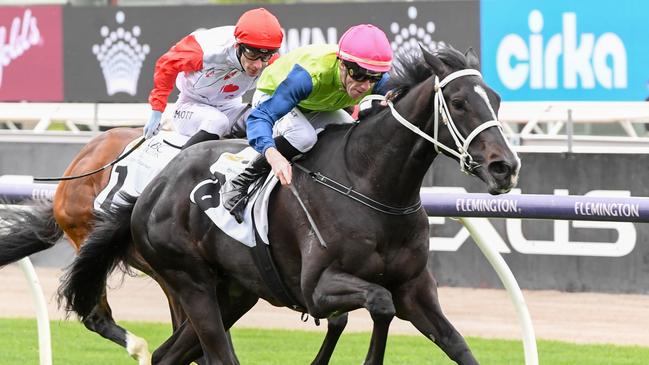 Keeneland (NZ) ridden by John Allen wins the ABC Bullion Super Impose Stakes at Flemington Racecourse on October 05, 2024 in Flemington, Australia. (Photo by Brett Holburt/Racing Photos via Getty Images)