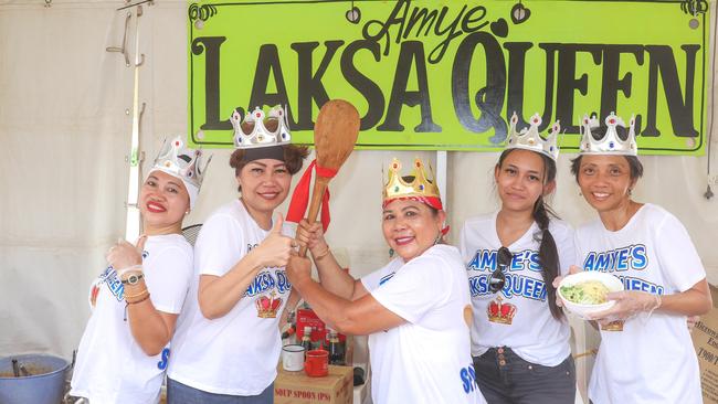 Amye’s Laksa Queens with the their giant spoon at the final event of the 2022 Laksa Festival. Picture: Glenn Campbell