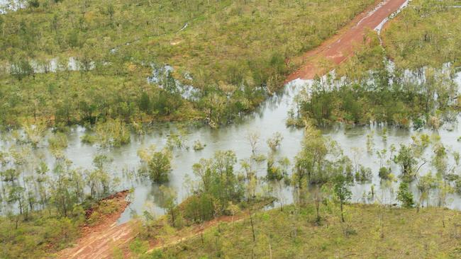 A flooded road is seen near Borroloola on Wednesday, March 27, 2019. More than 2000 people were evacuated from communities, ahead of Cyclone Trevor, the largest such effort in the NT since Cyclone Tracy hit Darwin in 1974. Picture: Keri Megelus