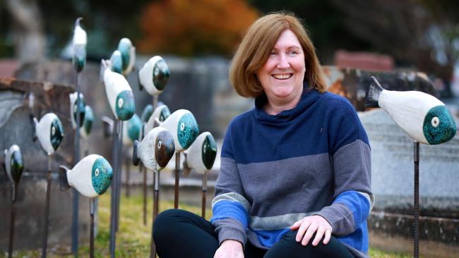 Artist Julianne Smallwood with her exhibition at Rookwood Cemetery. Pictures:  Angelo Velardo