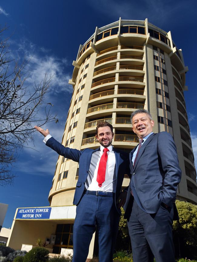 Belle Property agents Mark Lazarus and Alan Lim outside Glenelg’s revolving restaurant. Picture: Tom Huntley