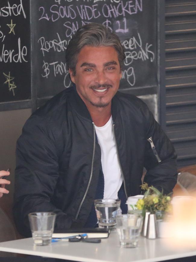 John Ibrahim joined Sandilands at the cafe. Picture: John Grainger