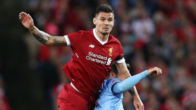 Dejan Lovren of Liverpool wins a header.