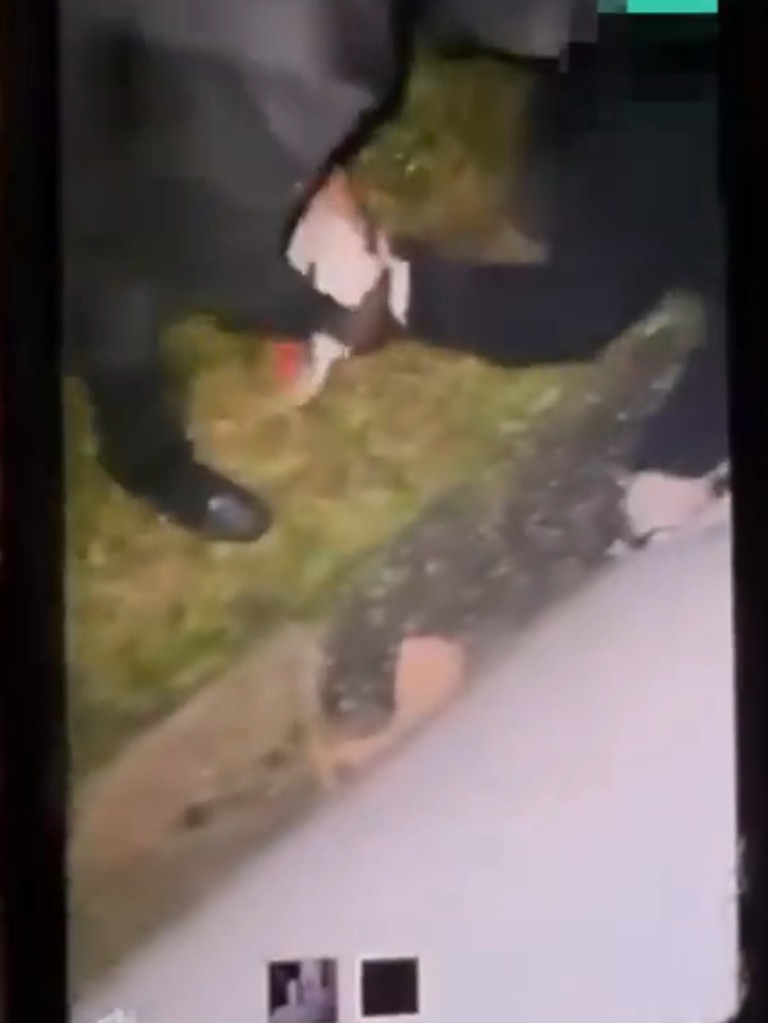 Footage showed the offenders taking the shoes from his feet.