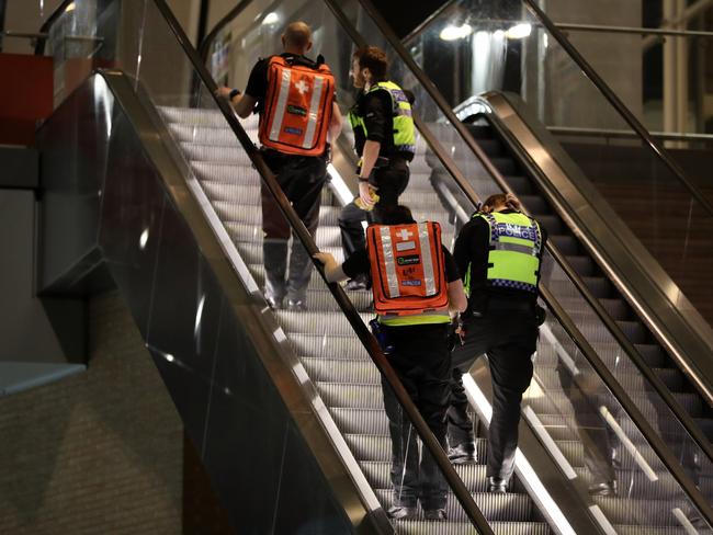 Medics make their way up the escalator by The Shard at London Bridge. Picture: Getty