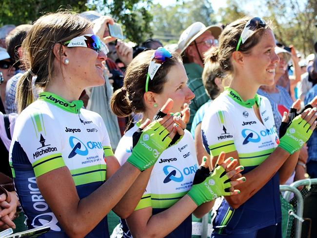 Orica-AIS riders celebrate Gracie Elvin's back-to-back in the women's road race. Picture: Reece Homfray