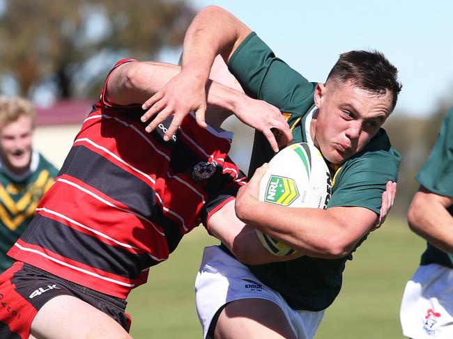 Farrer five-eight Mitchell Henderson heads in to score a try. Edwards College, Gosford, beats Farrer, Tamworth, 18-16 in a thriller at Tamworth in the National Schoolboy Rugby League Cup.  The Daily and Sunday Telegraph have secured the exclusive rights to live stream the prestigious National Schoolboy Cup competition. Picture by Peter Lorimer.