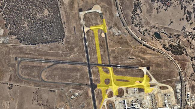 An overhead view of the new taxiway network to be built at Melbourne Airport, with the new tarmac highlighted in yellow. Picture: Supplied