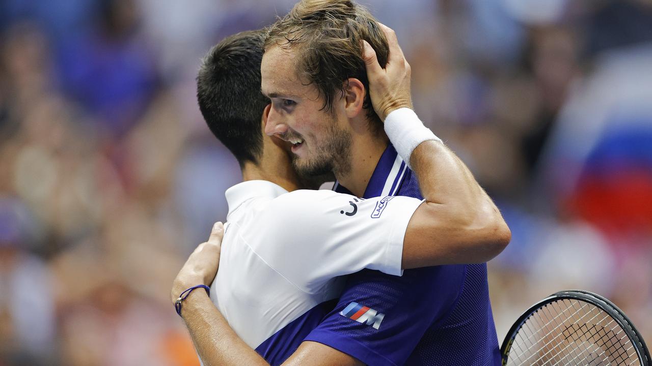 Daniil Medvedev and Novak Djokovic embrace after the match. Picture: Getty Images