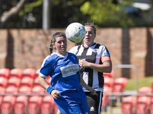 CLOSE CONTEST: Rockville's Penny Dukes (left) for Rockville and Willowburn's Kiama Gray battle for possession during last year's Toowoomba Football League Premier Women's grand final. Picture: Kevin Farmer