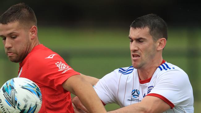 Luka Jurkovic, fighting for the ball against Port Melbourne’s Joshua Wilkins, earlier in the year, scored his first goal for North Geelong. Picture: Mark Wilson