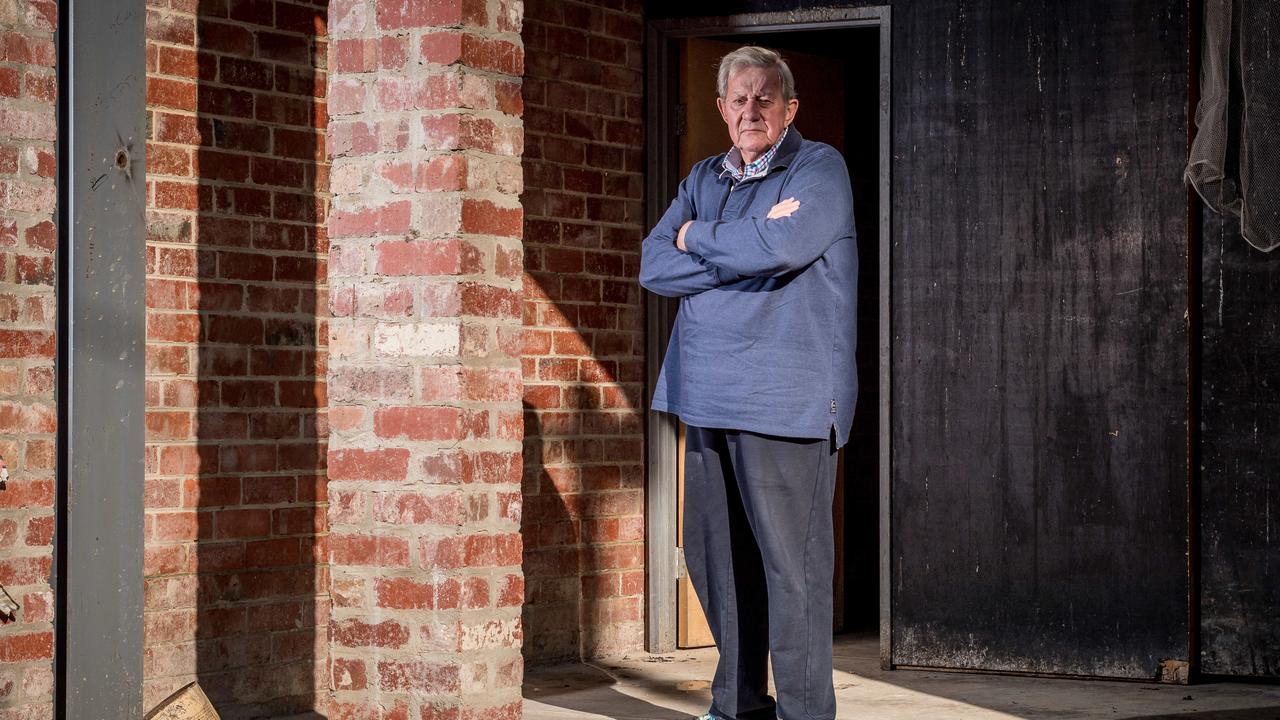 Phil Dwyer has long sought better protection for Victorians building homes, and is pictured here at a Melbourne home whose owners spent years in court pursuing their builder after he destroyed it with a chainsaw. Picture: Jake Nowakowski.