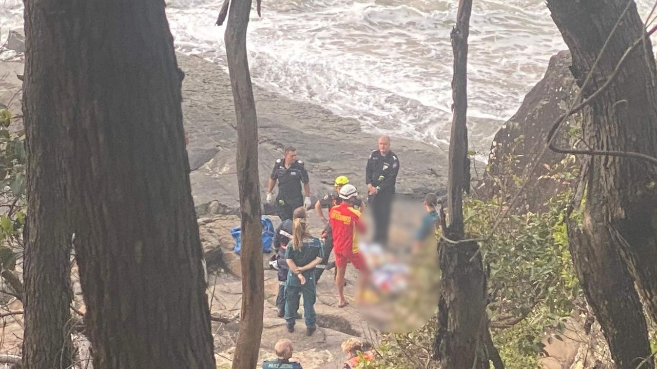 A man was winched from Tea Tree Bay after he fell 15m from a cliff.