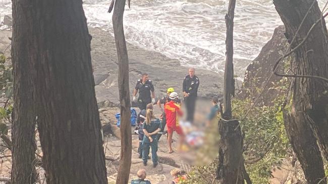 A man was winched from Tea Tree Bay after he fell 15m from a cliff.