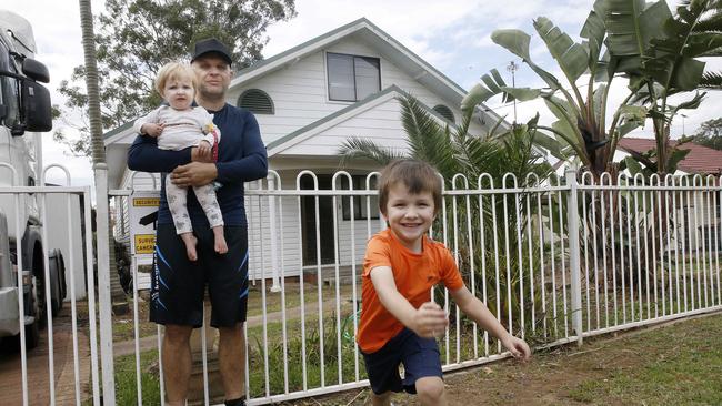 Mt Druitt resident George Jameson, with kids Milenija and Spasoje, said price rises in the area were “crazy”. Picture: John Appleyard