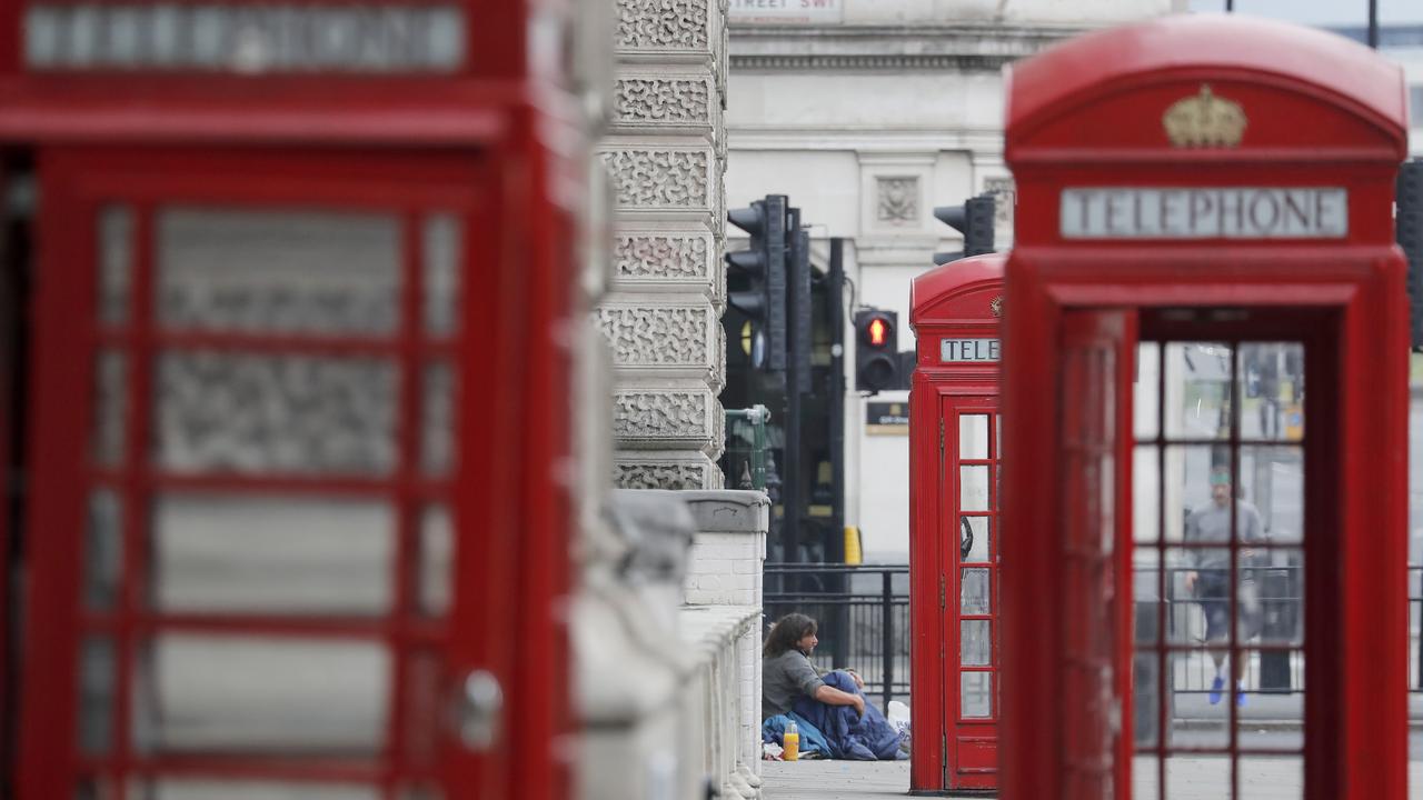 Homeless people sit on the pavement in Westminster, London, Monday, April 27, 2020. Picture: Frank Augstein/AP