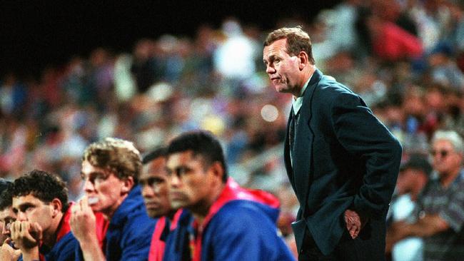 Malcolm Reilly stands behind his Knights bench in 1995.