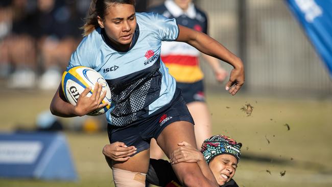 Holly Williams powers her way through the defence on her way to scoring.