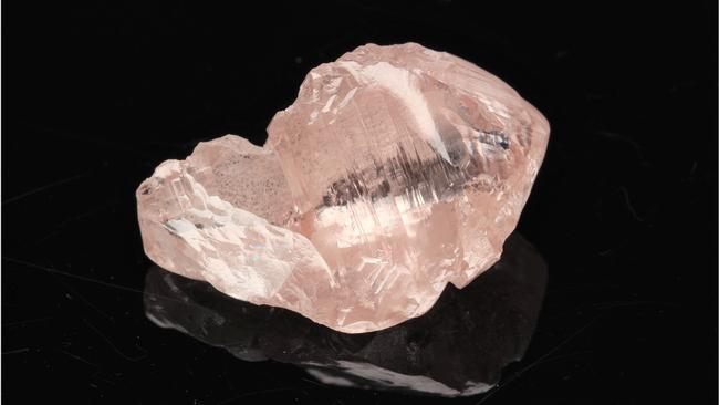 The price of rough diamonds, like this rare pink one, has slumped. Picture: Lucapa Diamond Company via NCA NewsWire