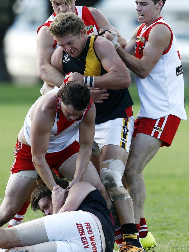 Karingal and Seaford players come to grips at Ballam Park. Picture: Paul Loughnan