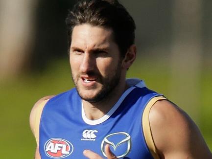 MELBOURNE, AUSTRALIA - JUNE 15: Jarrad Waite takes part in running drills during a North Melbourne Kangaroos AFL training session at Arden Street Ground on June 15, 2016 in Melbourne, Australia. (Photo by Darrian Traynor/Getty Images)