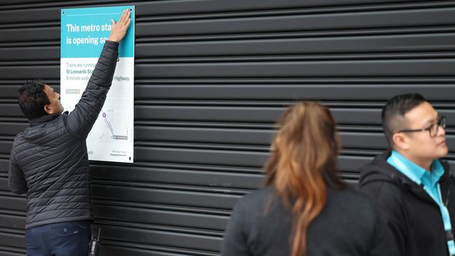 Staff were at the closed Metro Station in Crows Nest on Monday morning to provide information to commuters. Picture: Rohan Kelly