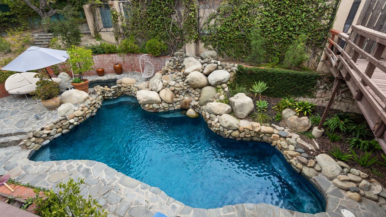 The pool and spa area is formed around a series of boulders. Picture: Marc Angeles/TopTenRealEstateDeals