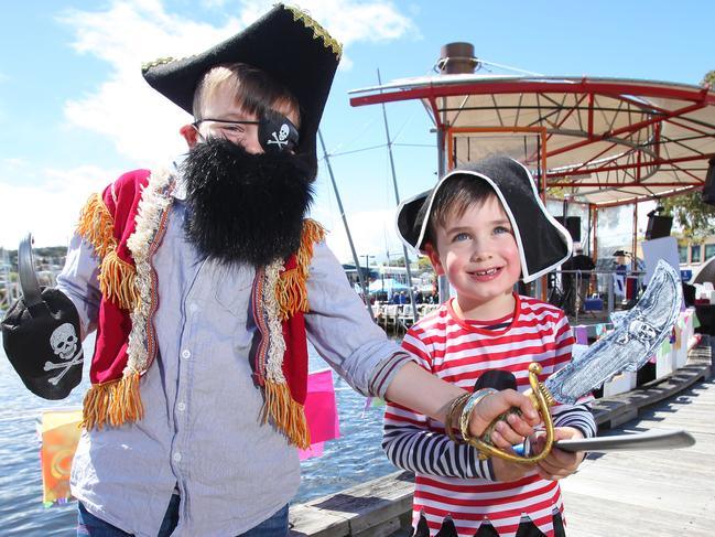 The annual Clarence Council's Seafarers festival is held at the Bellerive Boardwalk. (L-R) Finn (8) and Oliver (4 wearing a striped top) Buckland of Cremorne get in the spirit of the day. Ben Buckland is their father and his mobile is 0419 002 474. PIC: MATT THOMPSON