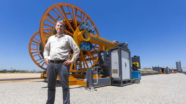 Tubi Systems’s Marcello Russo standing in front of a portable tube maker. Picture: GLENN HUNT