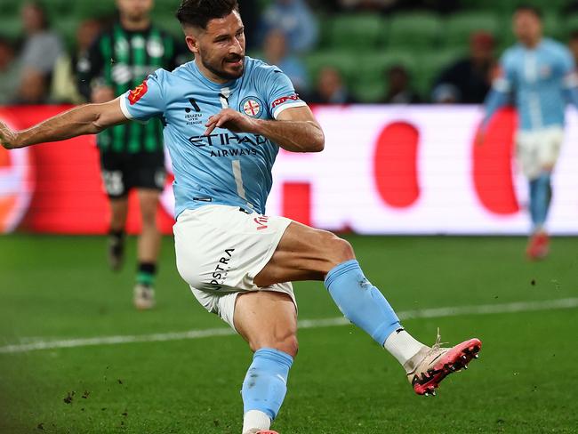 MELBOURNE, AUSTRALIA - MAY 16: Mathew Leckie of Melbourne City kicks a goal during the A-League Men Semi Final match between Western United and Melbourne City at AAMI Park, on May 16, 2025, in Melbourne, Australia. (Photo by Morgan Hancock/Getty Images)