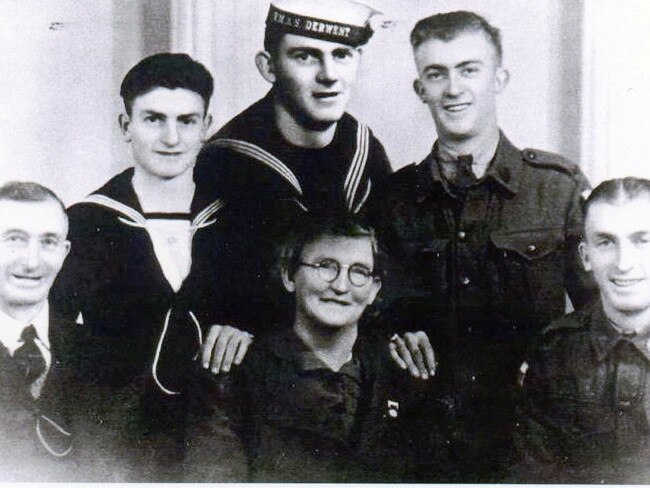 VALOUR: Teddy Sheean, second from left, with father James, mother Mary and three of his brothers who enlisted and fought in World War II.