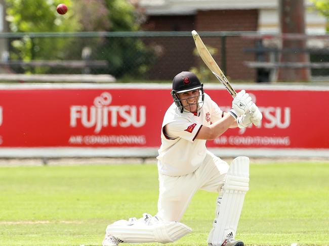 Isaac Conway sends the ball to the boundary. Picture: Hamish Blair