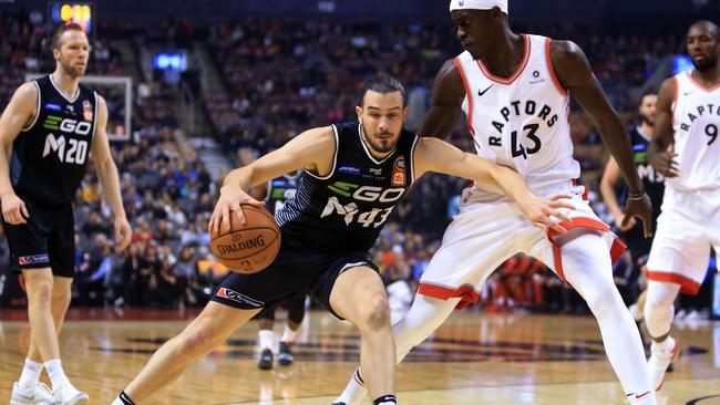 Melbourne United’s Chris Goulding takes on Toronto Raptors star Pascal Siakam last year. Picture: AFP