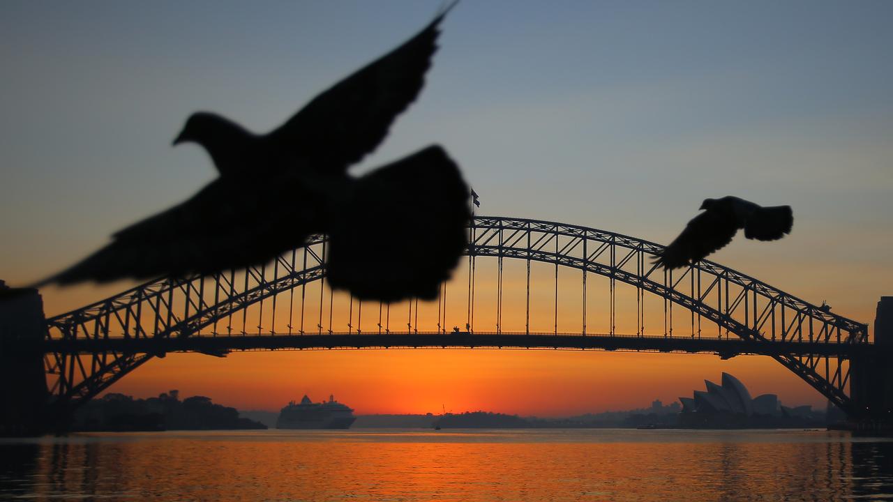 A smoky dawn over Sydney. Picture: AAP Image/Steven Saphore