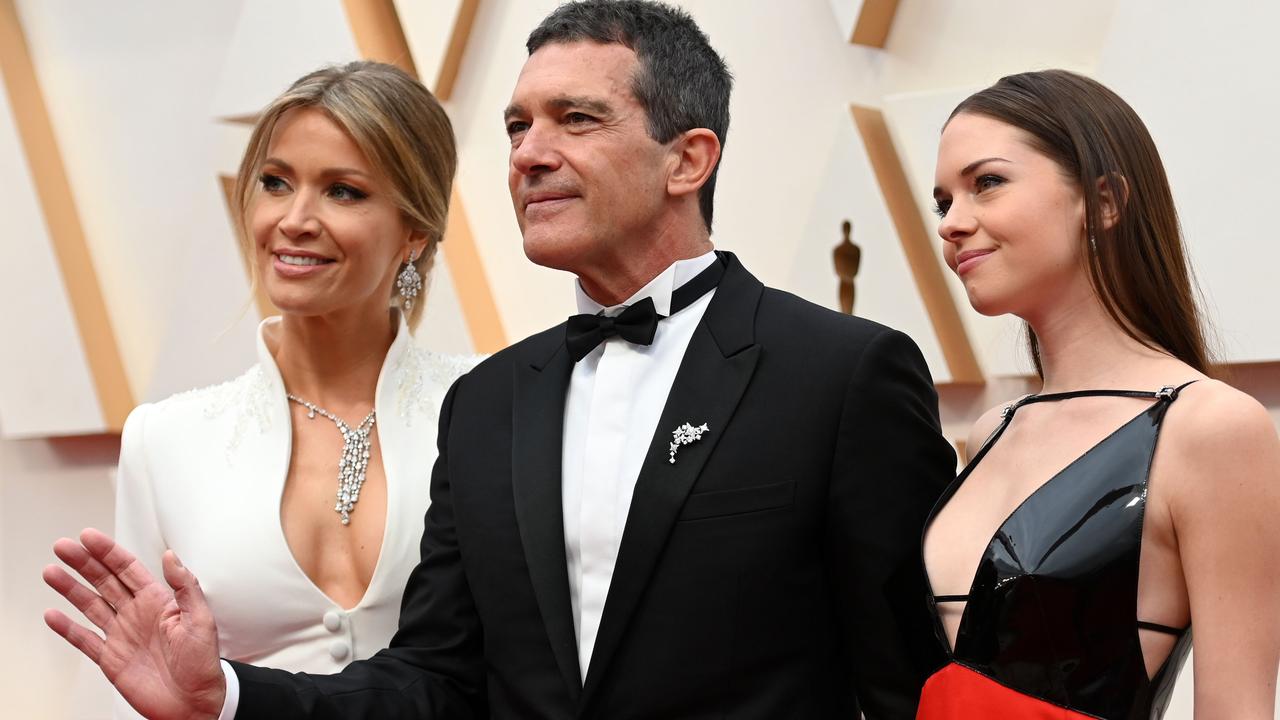 Nicole Kimpel (left), Spanish actor Antonio Banderas and daughter Stella Banderas arrive greet photographers on the red carpet. Picture: AFP