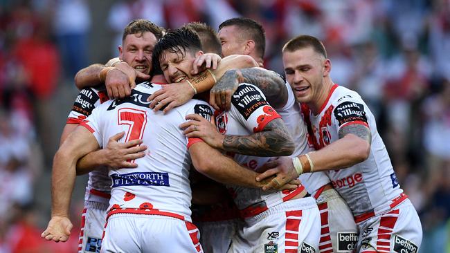 Ben Hunt of the Dragons (second left) celebrates with team mates after scoring a try during the Round 8 NRL match between the St George Illawarra Dragons and the Sydney Rooster at Allianz Stadium in Sydney, Wednesday, April 25, 2018. (AAP Image/Dan Himbrechts) NO ARCHIVING, EDITORIAL USE ONLY