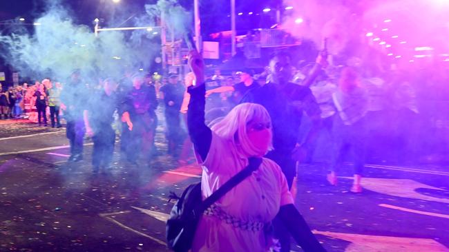 Protesters could be seen carrying smoke sticks. Picture: NCA NewsWire / Jeremy Piper