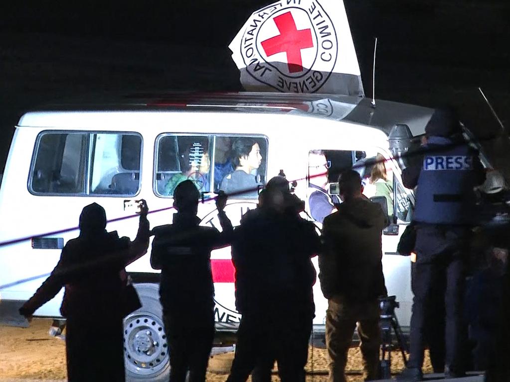 This image grab taken from AFPTV video footage shows an International Red Cross vehicle reportedly carrying hostages released by Hamas driving towards the Rafah border point with Egypt ahead of their transfer to Israel. Picture: AFPTV / AFP