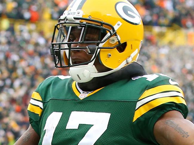 GREEN BAY, WI - JANUARY 11: Davante Adams #17 of the Green Bay Packers reacts after scoring a touchdown in the third quarter against the Dallas Cowboys during the 2015 NFC Divisional Playoff game at Lambeau Field on January 11, 2015 in Green Bay, Wisconsin. (Photo by Al Bello/Getty Images)