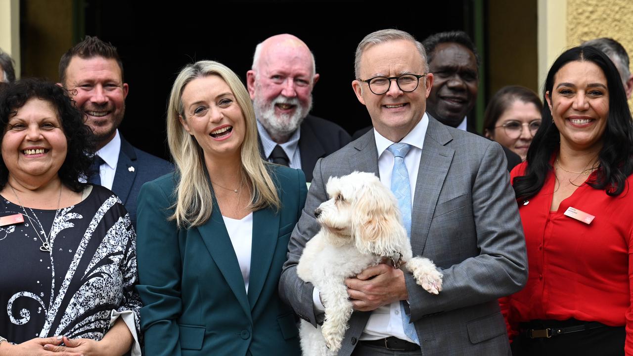 The couple pose with their dog, Toto. Picture: NCA NewsWire / Martin Ollman