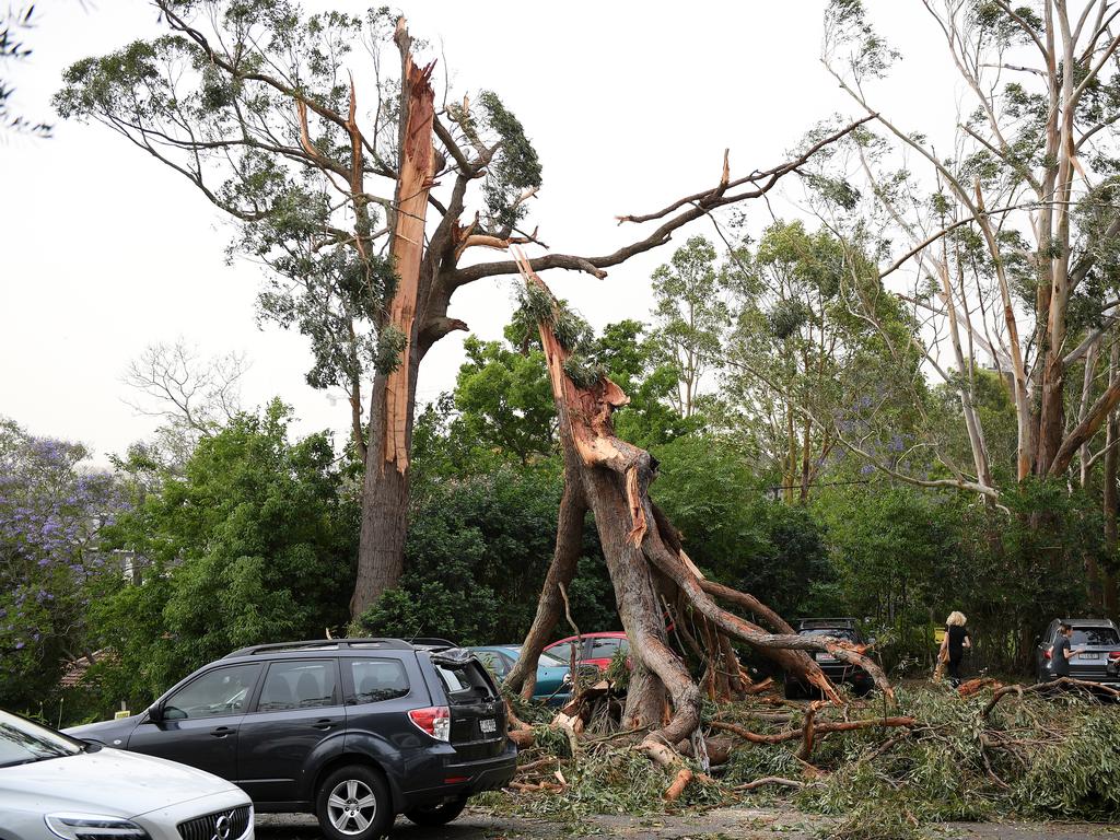 Storm damage is seen at St Johns Anglican Church, in Gordon, north of Sydney, Tuesday, November 26, 2019. A severe fast moving thunderstorm has passed over Sydney resulting in fallen trees and downed power lines in several Sydney suburbs. (AAP Image/Dan Himbrechts)