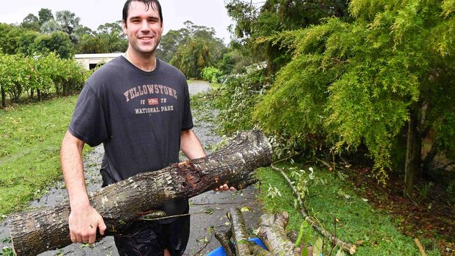 Stuart Woods starts the clean-up in Beerwah on Thursday. Picture: Patrick Woods