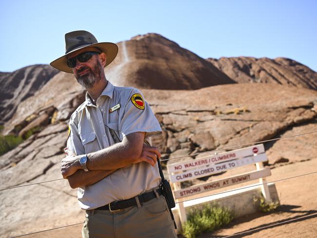 Operations Manager of Uluru Kata-Tjuta Park Steven Baldwin poses for photographs at Uluru, also known as Ayers Rock during sun rise at Uluru-Kata Tjuta National Park in the Northern Territory on Friday. Picture: AAP