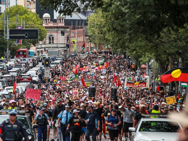 Demonstrators march towards Victoria Park during an Invasion Day protest in Sydney, Australia. Picture: Roni Bintang