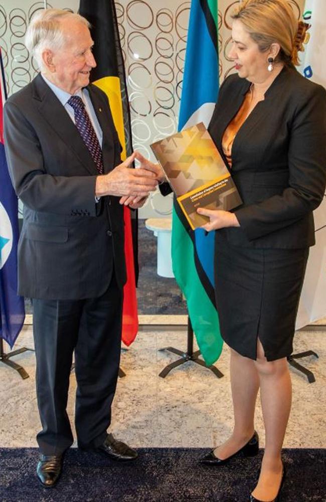 Tony Fitzgerald presents his report to Premier Annastacia Palaszczuk.