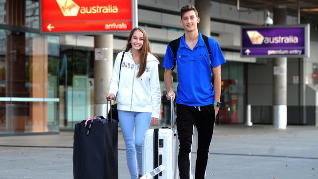 Brooke Hoffmann and Connor Roduner arrive at the Brisbane airport from Cairns. Picture: John Gass