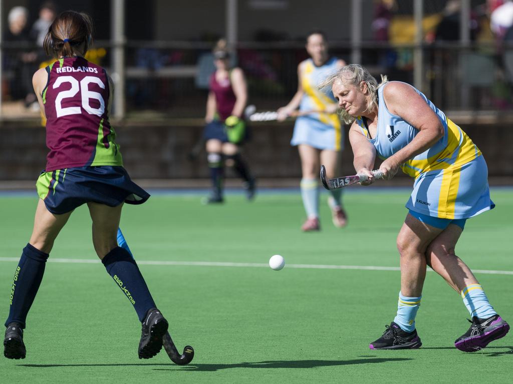 Kym Henley (right) of Cairns 1 VS Redlands 1.