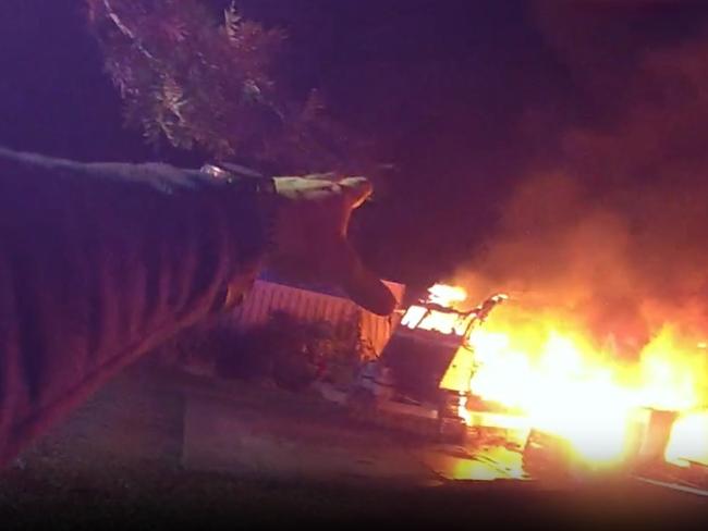 Bodywarn footage from the officer showed the caravan fully engulfed in flames when he arrived to the scene. Photo: Queensland Police