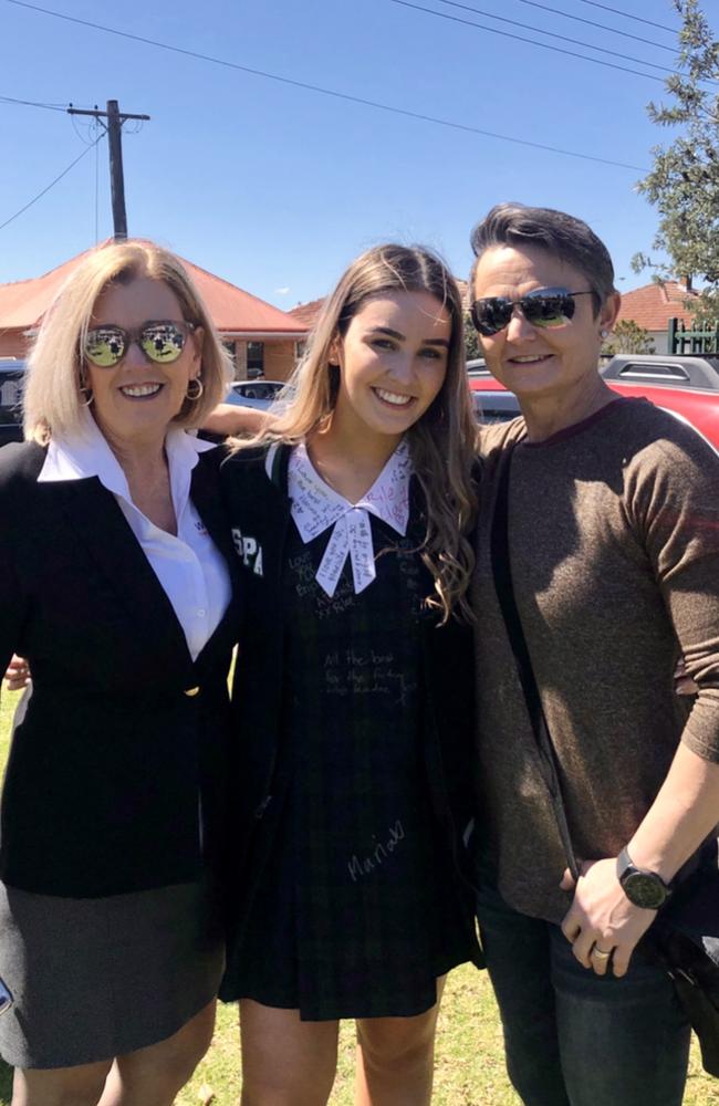 Libby Ruge and her mums Julie Ruge (left) and Jules Harrison. Picture: Supplied